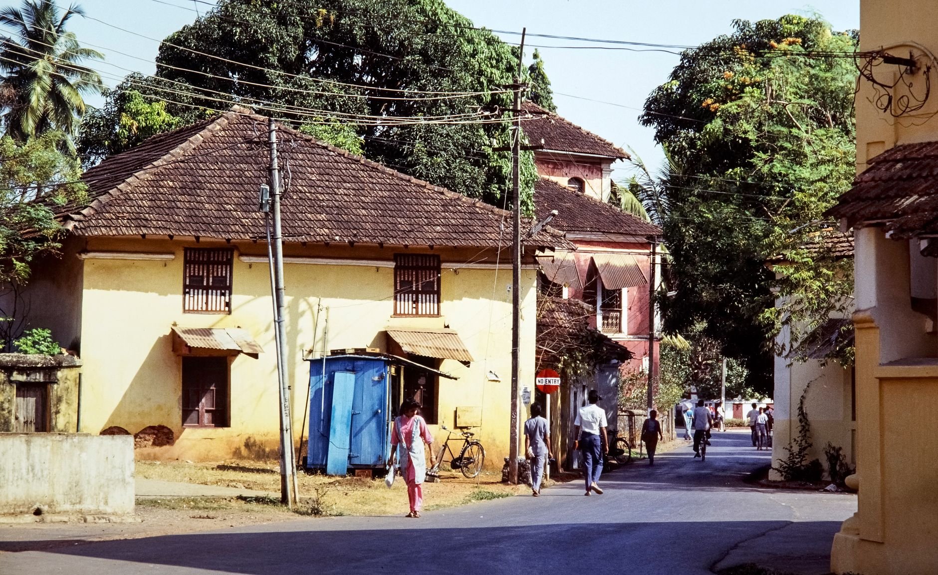 Charming street view in Goa, India — traditional architecture and lush tropical character
